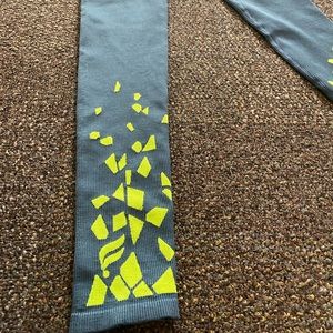 Fabletics teal and lime green workout pants and sports bra